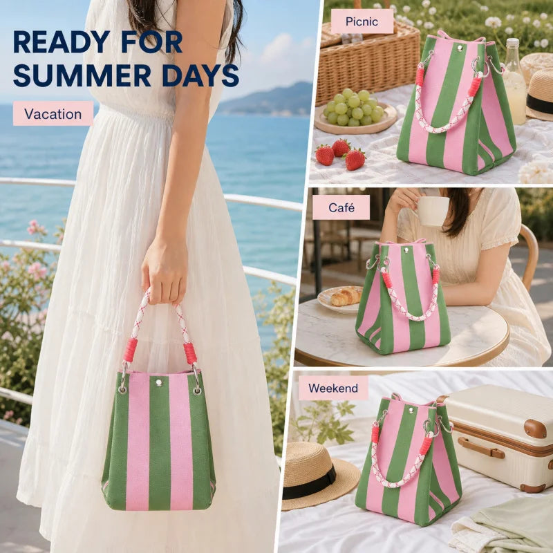 A woman holds a striped knit bucket tote bag with pink and green stripes outdoors in a sunny setting.