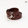 A brown PU leather strap coiled and displayed, featuring a silver metal clasp.