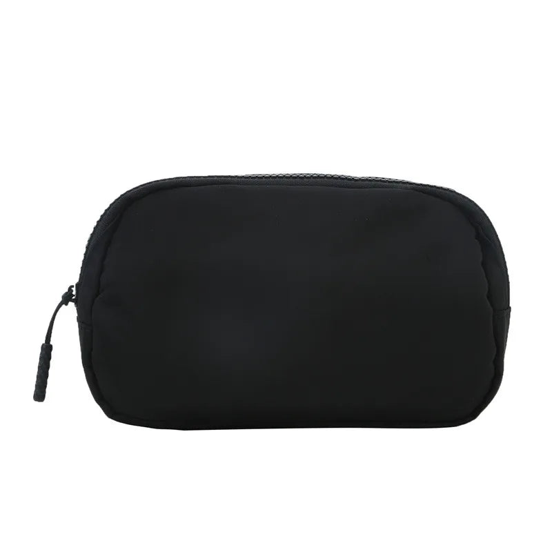 Black waist bag or fanny pack for women shown from the front.
