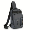 A dark gray adjustable crossbody sling bag with multiple zippered compartments and a black strap.