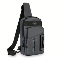 A dark gray adjustable crossbody sling bag with multiple zippered compartments and a black strap.