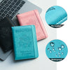 A pink and teal passport holder with an eagle design, showing PU leather material and waterproof features.