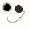 Silver zinc alloy folding handbag hook with a circular opening and curved handle.