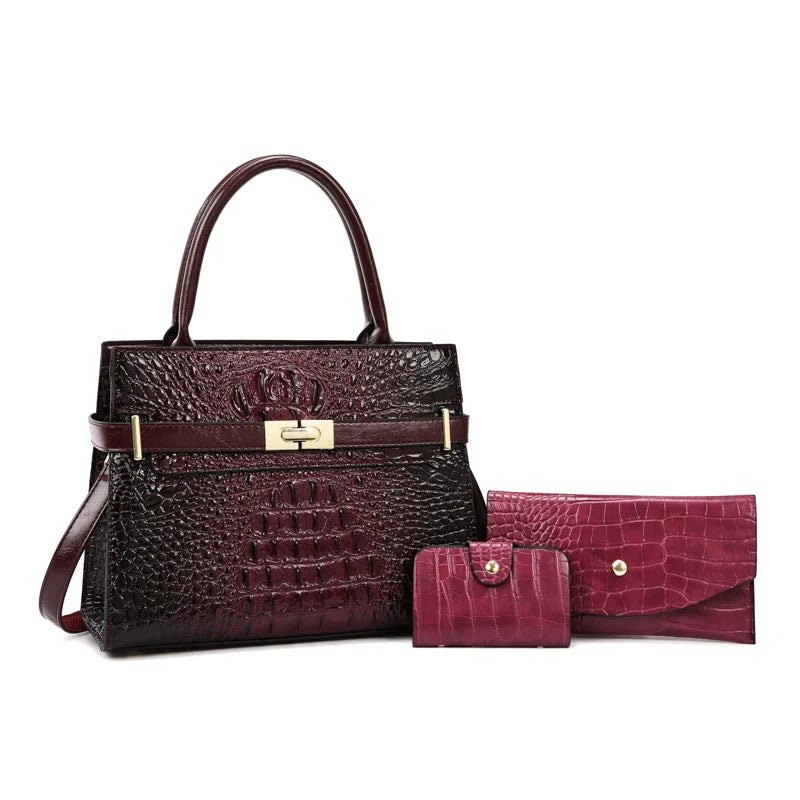 A dark burgundy PU leather shoulder handbag and a matching wallet set.