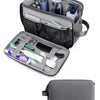 A gray toiletry bag with an open compartment showing various grooming tools and bottles.