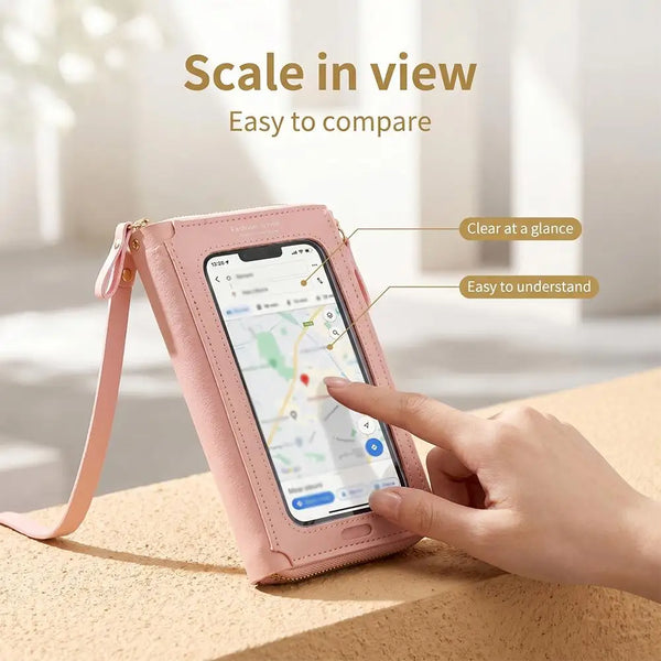 A hand is holding a pink touch screen crossbody phone bag with a smartphone displaying a map.