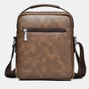 Mochila de cuero marrón vintage con cremallera y correas de cuero.
