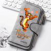 A gray zippered pouch featuring an orange tiger illustration and the word forever