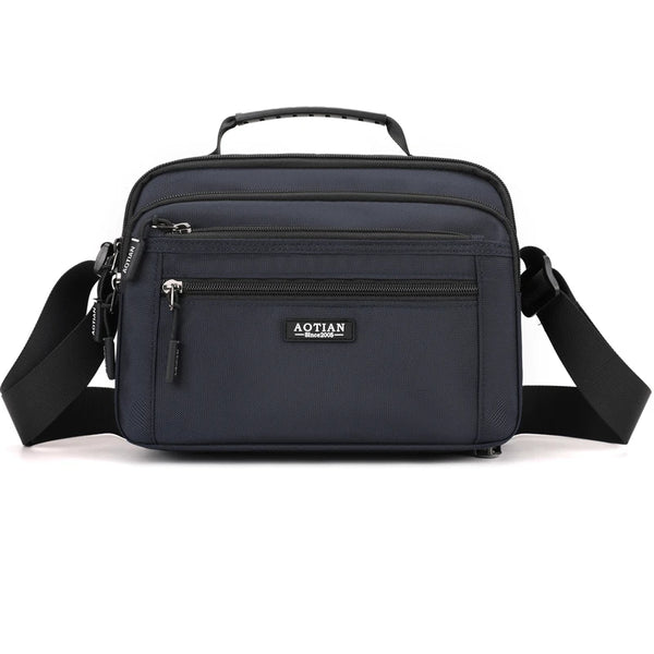 A dark blue Aotian compact waterproof crossbody messenger bag with black strap.