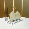 A white satin pleated evening clutch bag with a gold-toned handle displayed on a white surface.