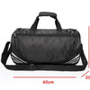Black PU leather travel duffel bag with a handle and straps shown from the front.