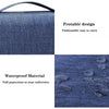 A dark blue fabric toiletry washbag with a hanging hook, highlighting its portable and waterproof features.