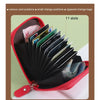 A red wallet with 11 slots is shown, displaying various card positions and zippered change bags.