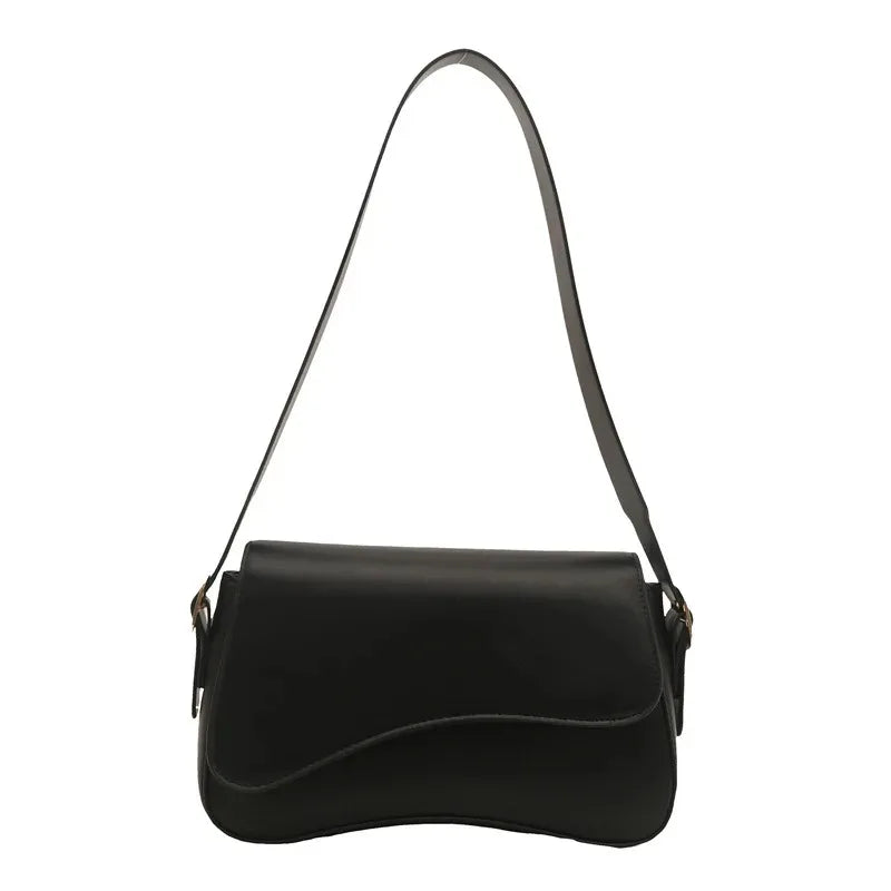 Black vintage curved flap shoulder bag made of soft faux leather