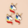 Two gold-plated unicorn horse charm pendants featuring rainbow stripes on a white background.