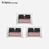 Three clear plastic bags containing cosmetic items or tools for portable organization