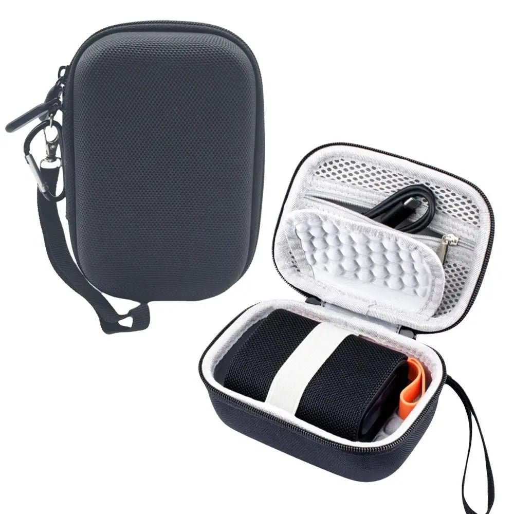 A dark gray hard shell case for a digital camera with an open interior showing foam padding and a lens cover.
