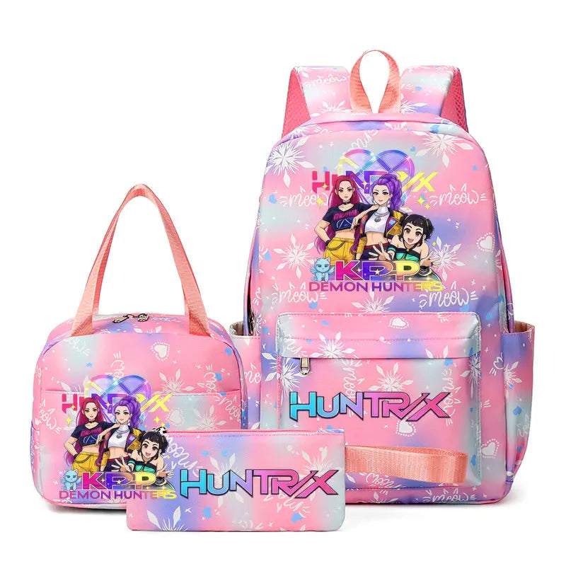 A pink multi-compartment backpack set featuring a vibrant floral pattern and purple accents.