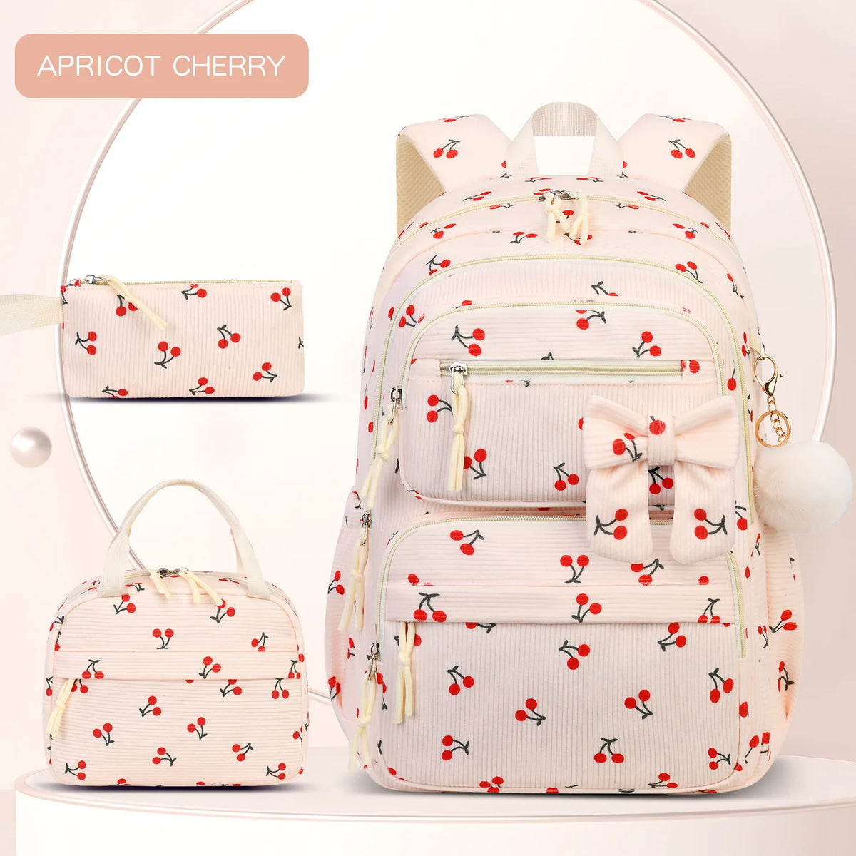 Pinkes Aprikos-Kirsch-Thema-Rucksack-Set mit Hauptrucksack und kleinerem Beutel.