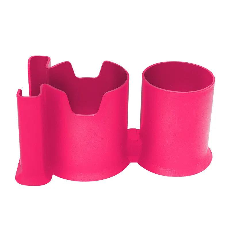 A bright pink multi-functional kayak drink holder and phone stand.