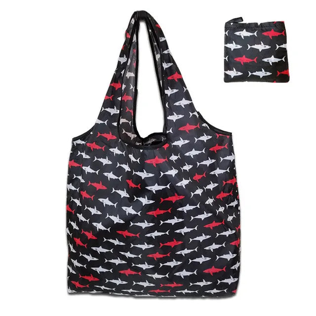 Black and red patterned reusable shopping bag with a small matching pouch.