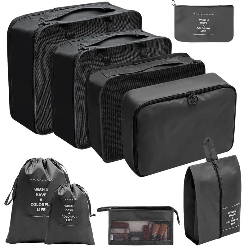 A set of black fabric storage organizers including various sized pouches and a zippered case.