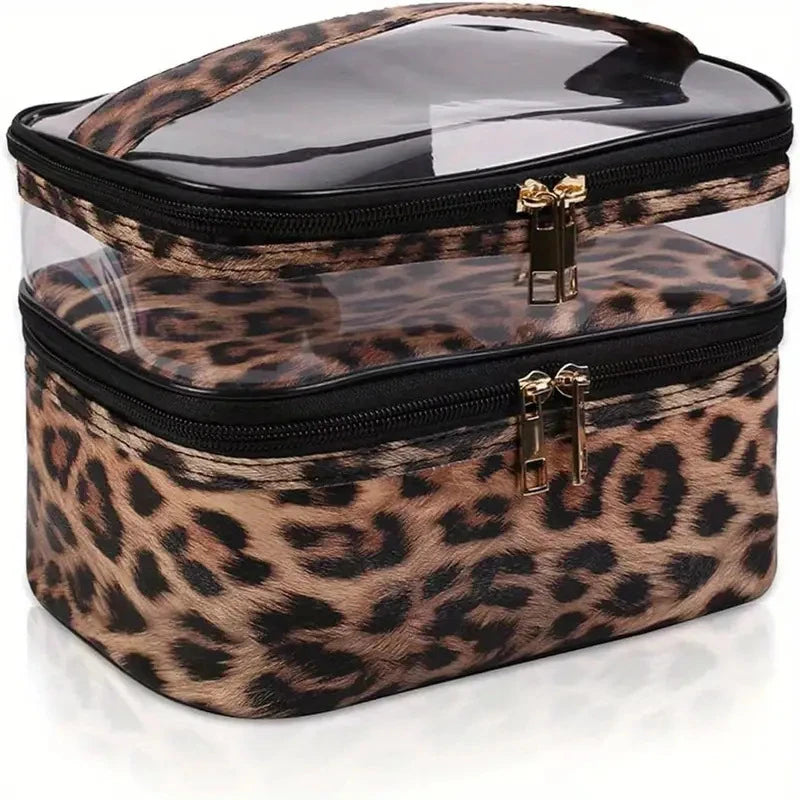 A clear plastic makeup bag with a leopard print exterior and black zipper details.