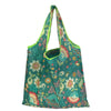 A reusable tote bag made of green nylon fabric with a floral pattern.