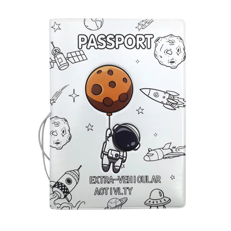 A white passport cover featuring a travel theme with illustrations of space objects like planets and rockets.