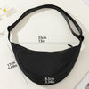 Black women's preppy sling crossbody bag shown with size measurements on a light background.