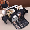 A black portable side-zip cosmetic organizer bag is shown open, displaying various makeup and beauty products.