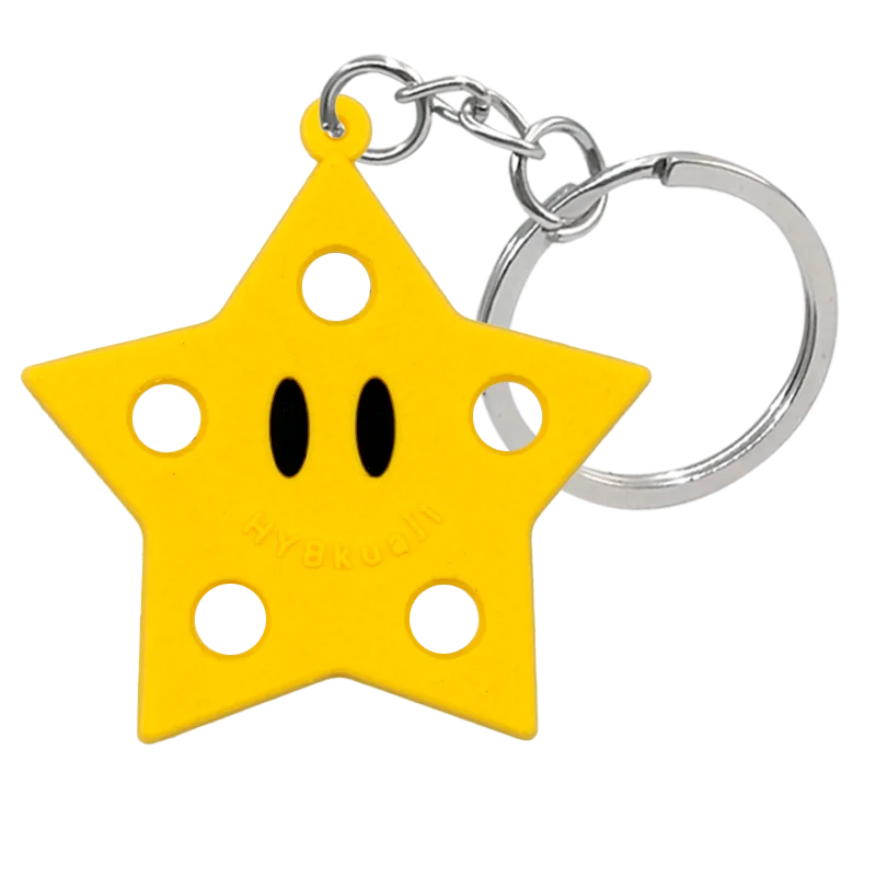 Porte-clés charm en silicone étoile jaune avec anneau à cliquet argenté.