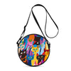 A round cartoon cat crossbody bag featuring colorful cats in various poses.