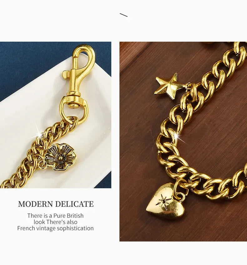 Gold alloy bag pendant necklace featuring a delicate chain and a flower charm.
