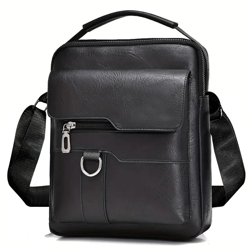 Sac bandoulière noir en PU pour homme avec poche zippée et sangle réglable.