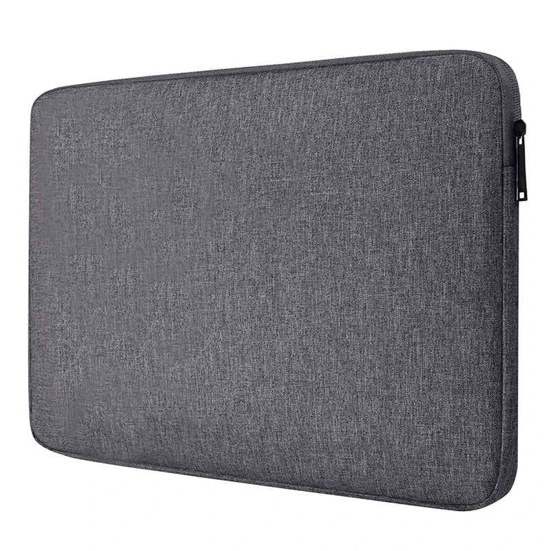 A dark gray waterproof canvas laptop sleeve with a soft fleece lining.