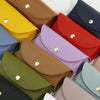 A collection of PU leather hard shell sunglasses cases in various colors including yellow, brown, red, purple, and blue.