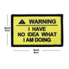 A yellow warning patch with black text that reads WARNING I HAVE NO IDEA WHAT I AM DOING