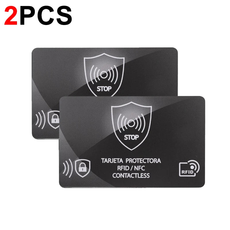 Two black RFID blocking cards with a shield design and STOP symbol for protection