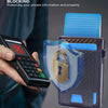 A hand holds a black electronic device next to an RFID blocking wallet featuring a shield design.
