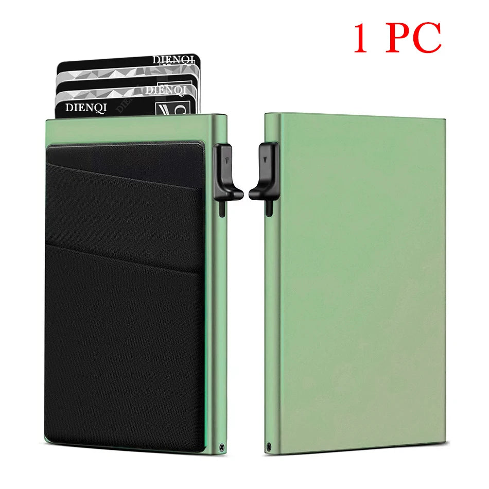 A green metal card holder with a black sleeve and an RFID blocking card is shown next to the empty holder.
