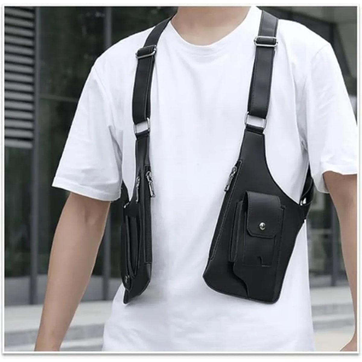 Black concealed underarm travel wallet with a phone pocket worn across the chest on a white t-shirt.