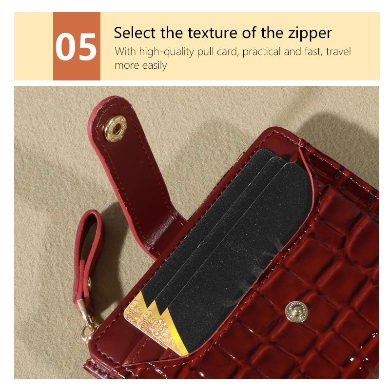 A close-up of a maroon PU leather card wallet showing the texture and zipper detail.