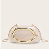 A light beige evening clutch bag with a gold-tone curved design and gold chain strap.