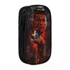 A black pencil case featuring a graphic design of a man's face in fiery red tones.