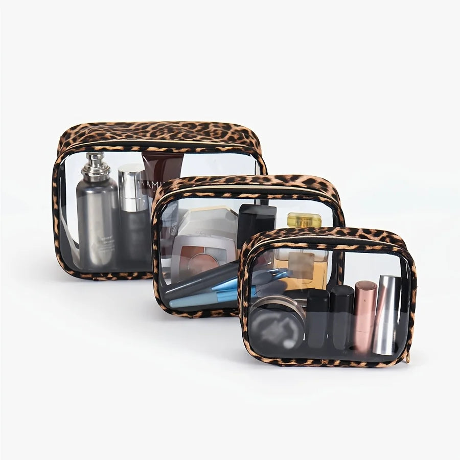 A leopard print clear cosmetic bag filled with various makeup and skincare products.