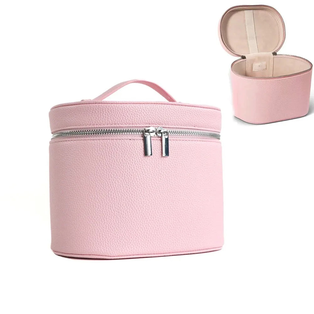 A pink travel makeup organizer case with a zipper closure and a removable lid.