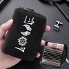 A black compact RFID-blocking card wallet with 11 slots is held in a hand, displaying various symbols.
