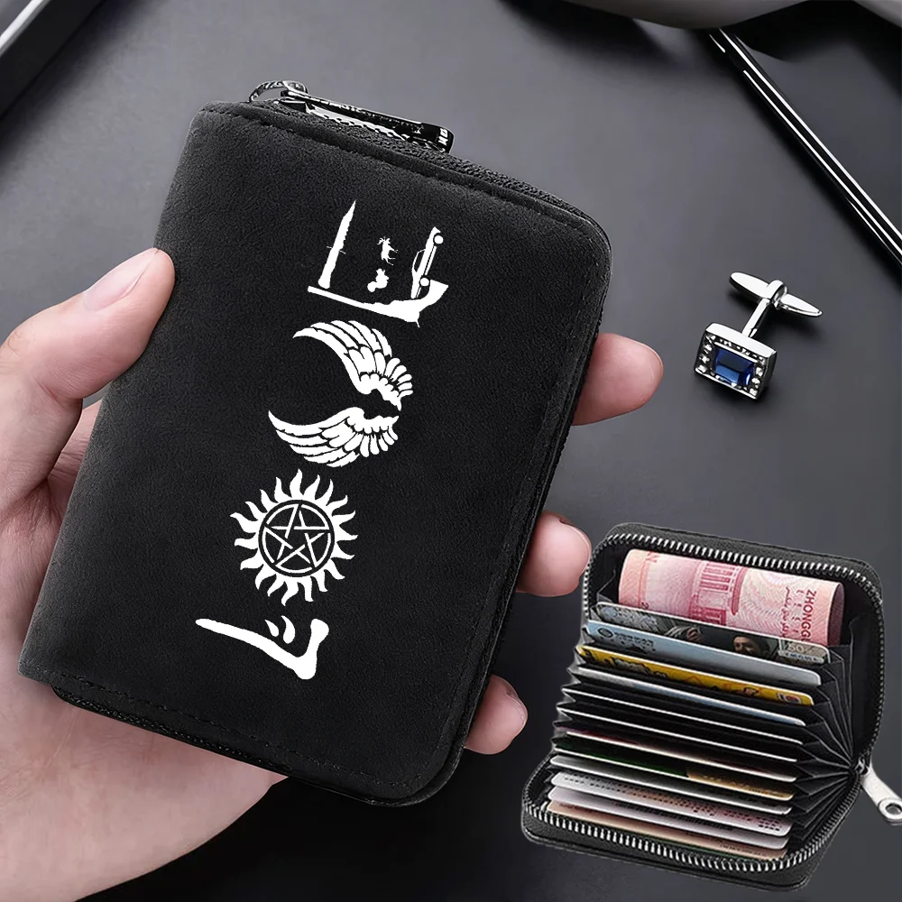 A black compact RFID-blocking card wallet with 11 slots is held in a hand, displaying various symbols.