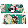 A green and pink patterned PU leather pencil case featuring a Demon Slayer design.